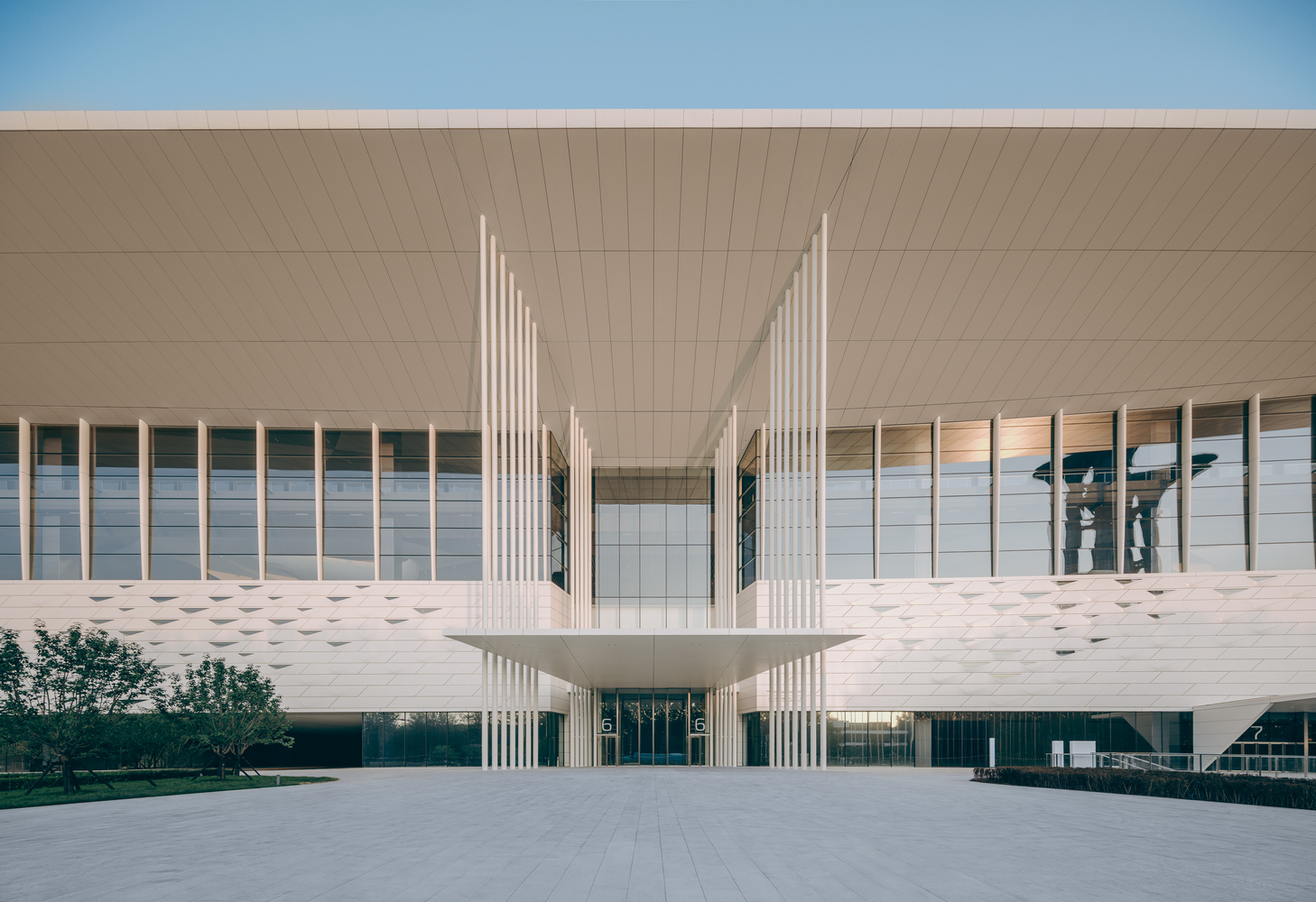 Daytime photo of Architecture — Building facade night lighting