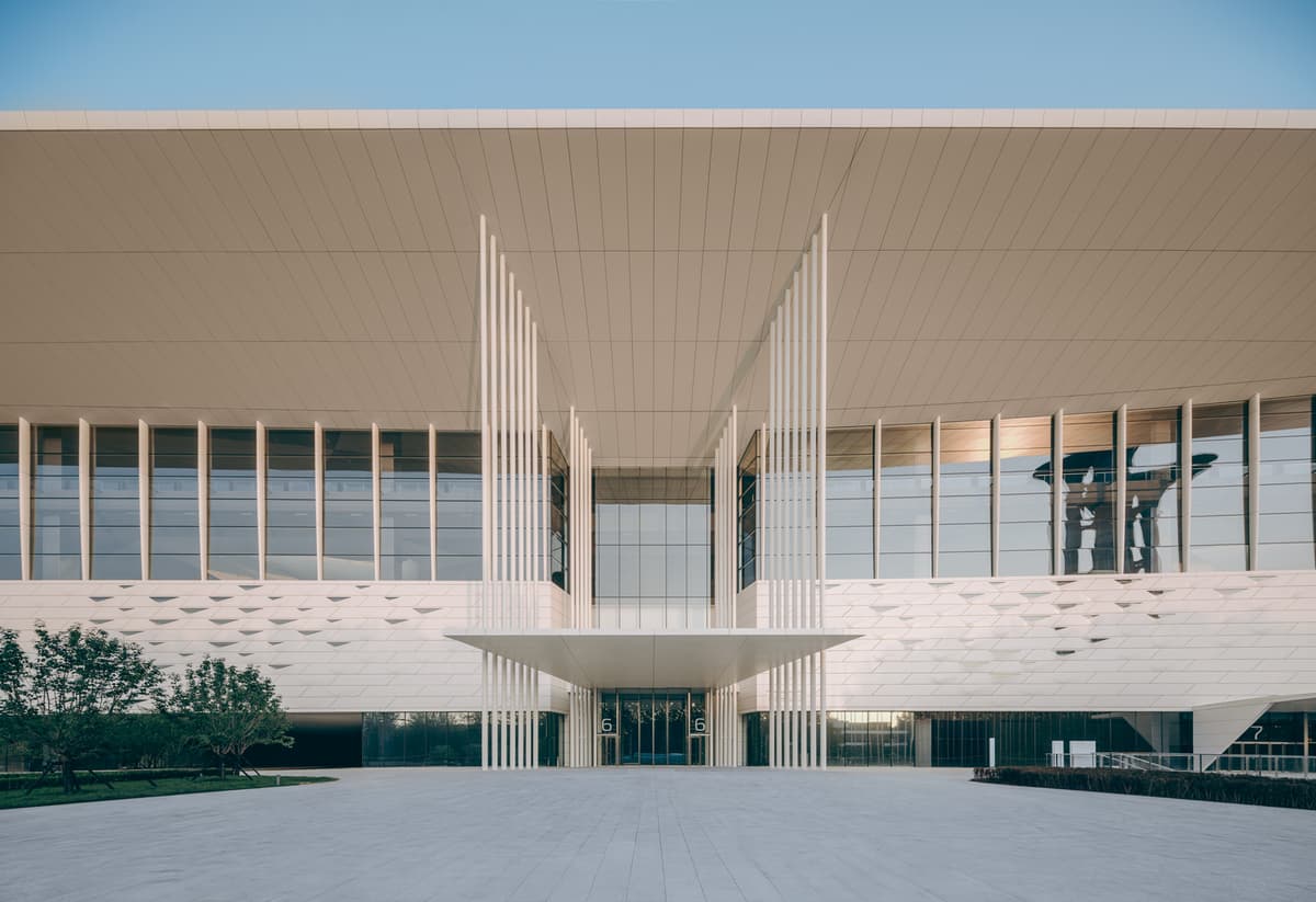 Daytime photo of Architecture — Building facade night lighting